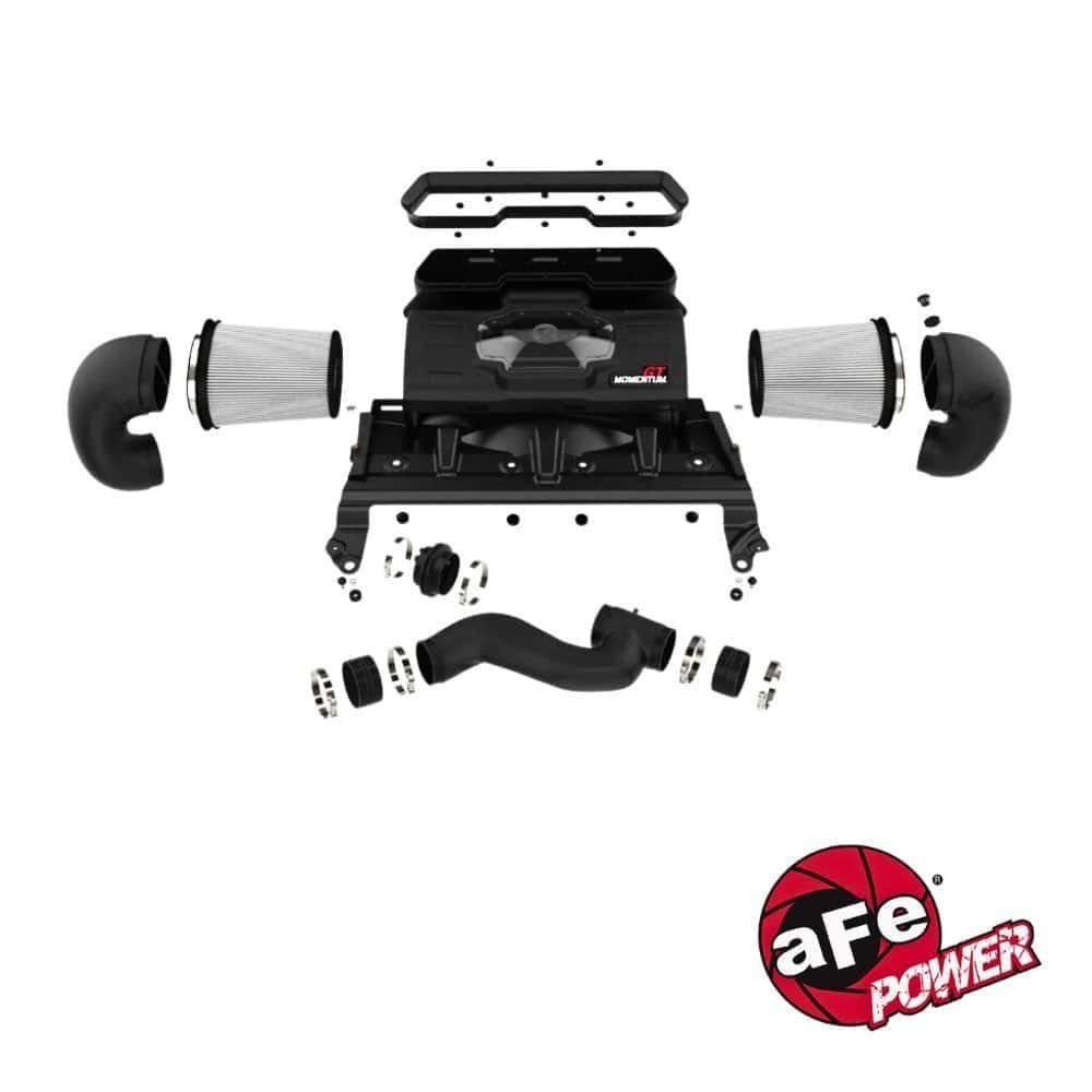 High-performance automotive air intake system with filters and hoses for engine enhancement.