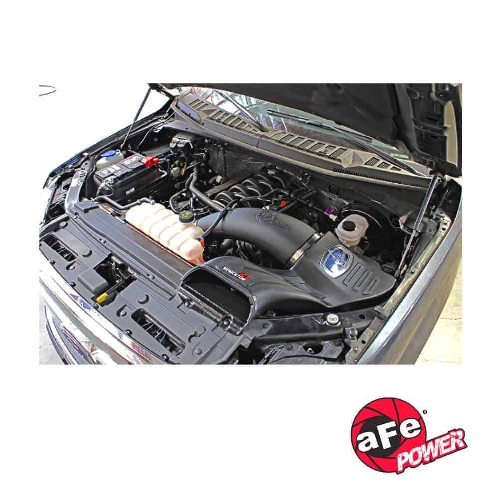 High-performance car engine with AFE Power logo, under open hood.
