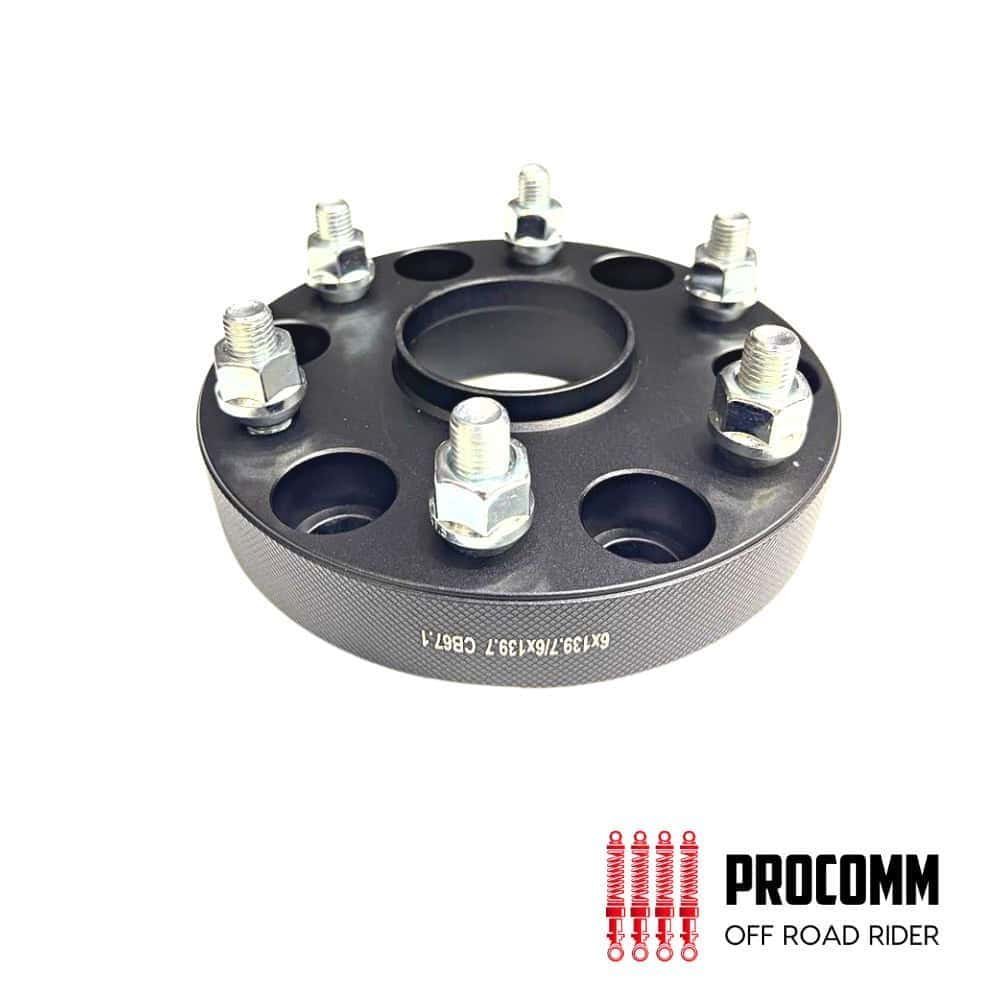 Wheel spacer for off-road vehicles, durable steel construction, enhances tire clearance and stabilit.