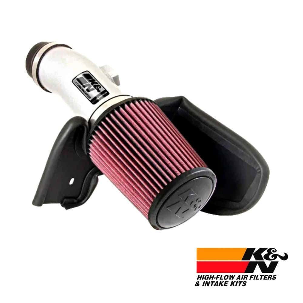 High-flow air filter and intake kit for vehicle performance enhancement.
