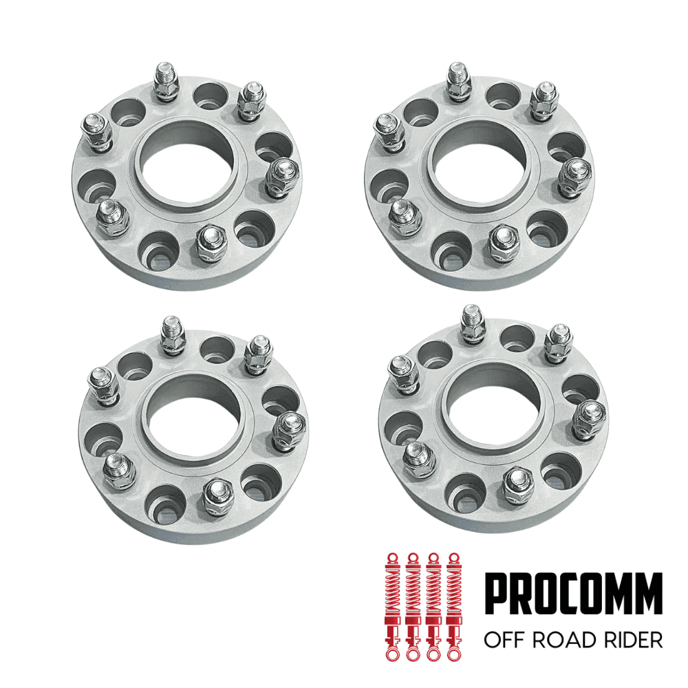 Wheel spacers for off-road vehicles with PROCOMM branding, four metal components.