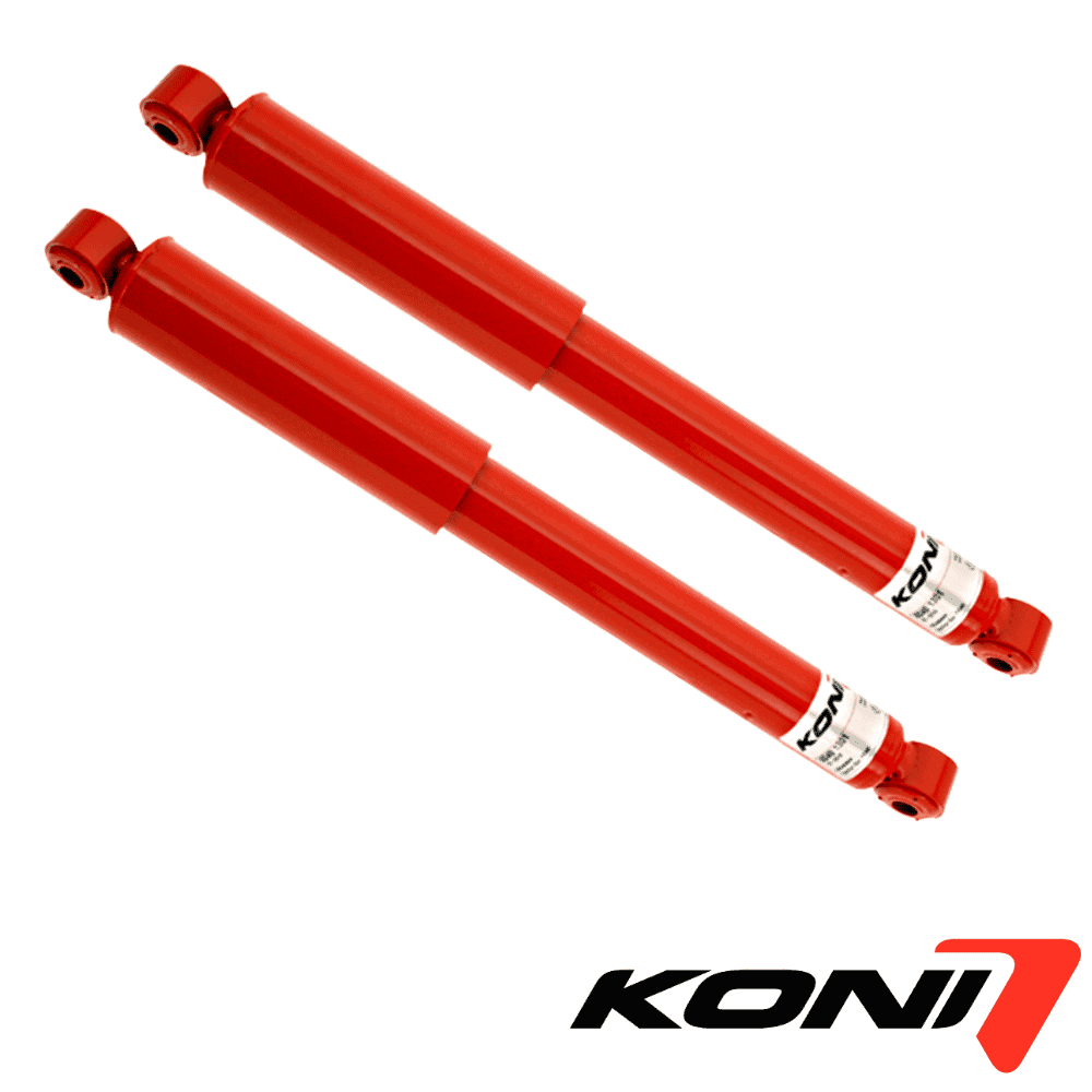 Red KONI shock absorbers for automotive suspension systems.