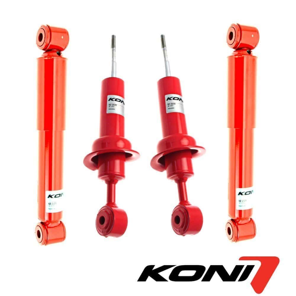 Shock absorber set for vehicle suspension, red color, high-performance automotive parts.