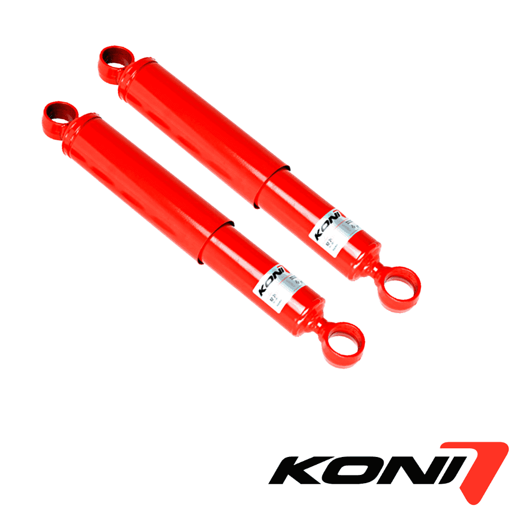 Red KONI shock absorbers for vehicle suspension systems.