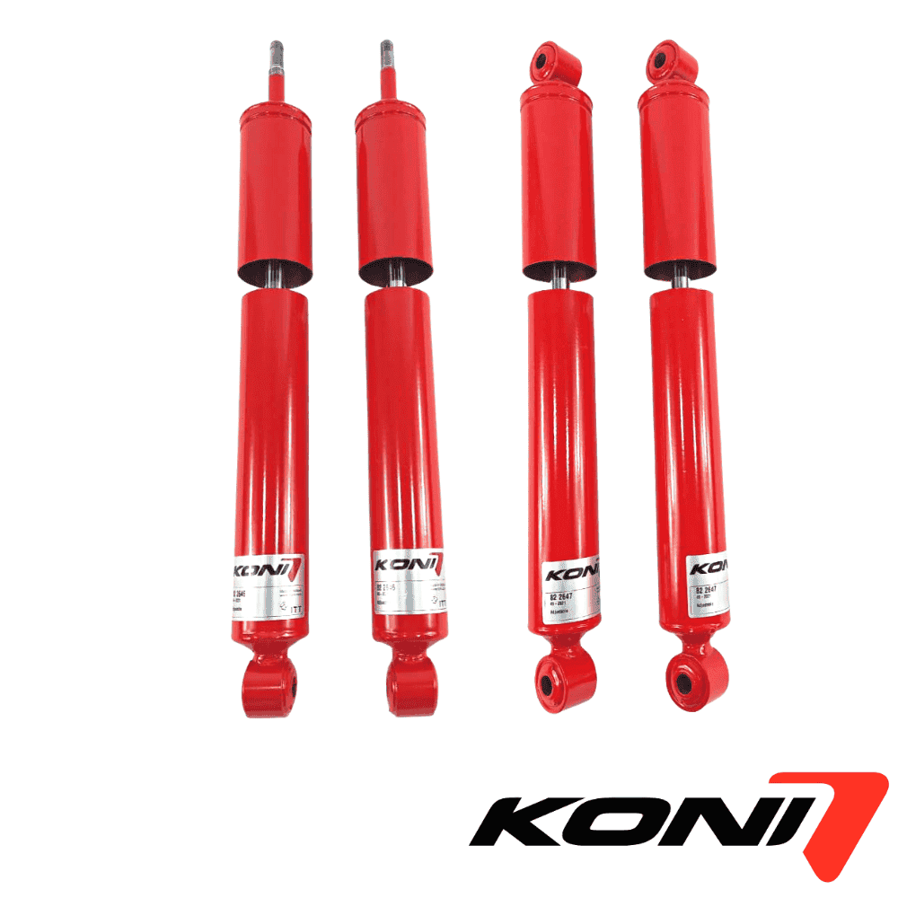 Red KONI shock absorbers for vehicle suspension systems.