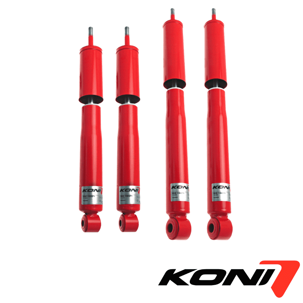 Red KONI shock absorbers for vehicle suspension systems.