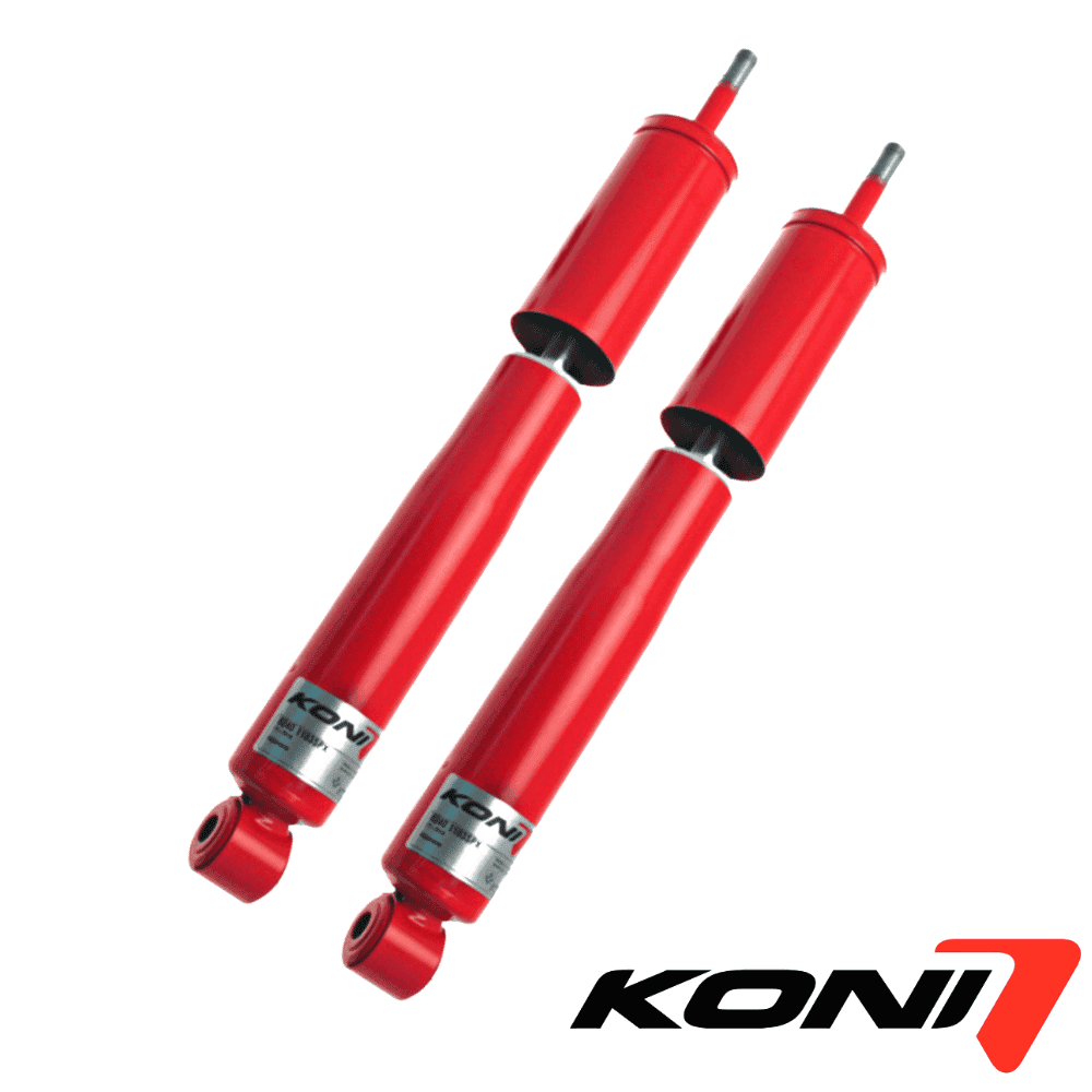 Heavy-duty red shock absorbers for vehicle suspension systems.