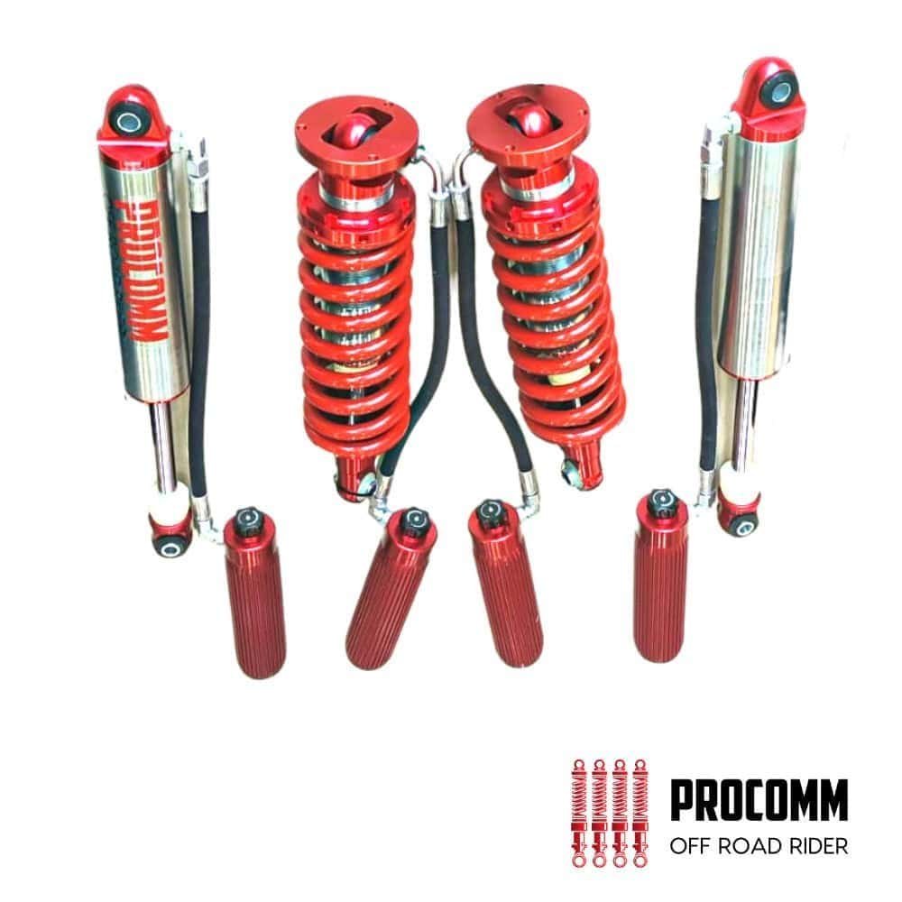 High-performance red off-road shock absorbers for vehicle suspension systems.