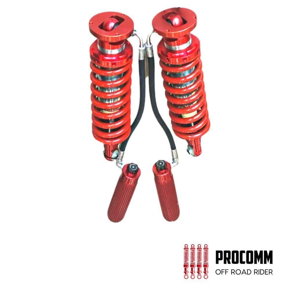 Red off-road motorcycle shock absorbers for enhanced suspension and stability.