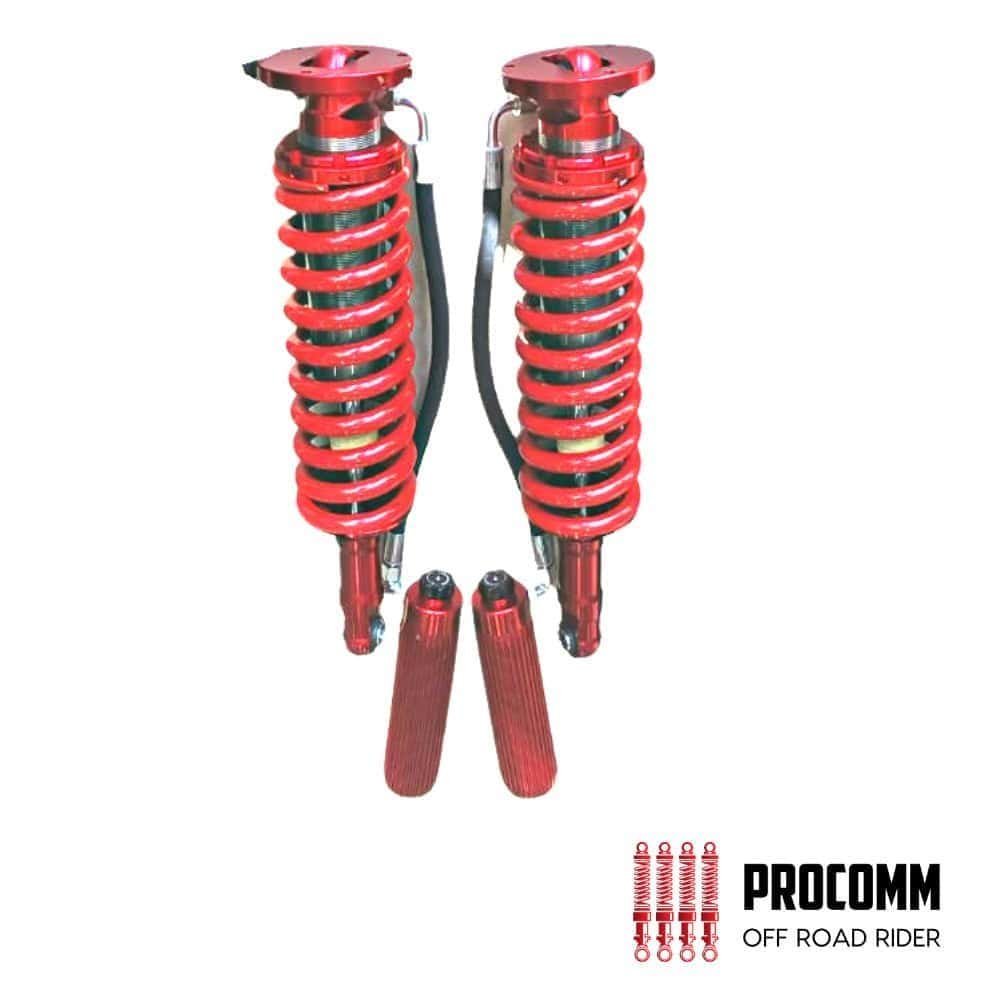 Red off-road shock absorbers for vehicles, displayed with additional components.
