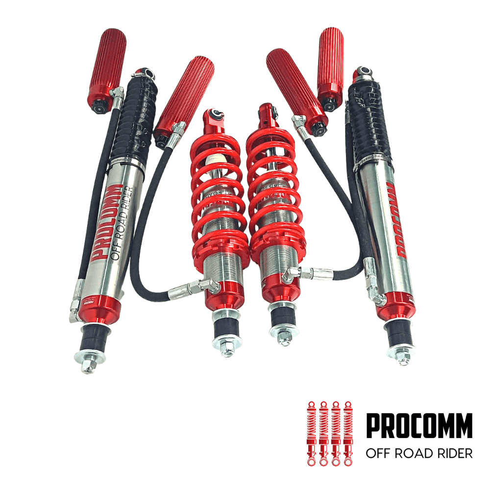 High-performance off-road shock absorbers with red coil springs for rugged terrain.
