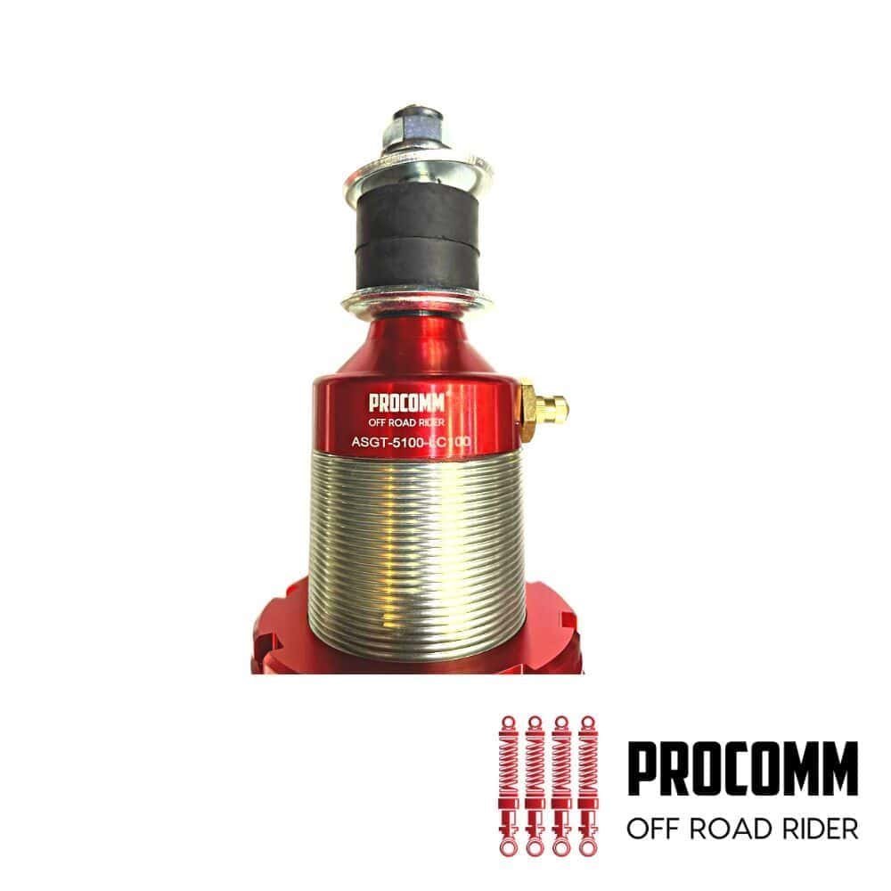 Procomm off-road rider shock absorber with red coil springs and durable construction.