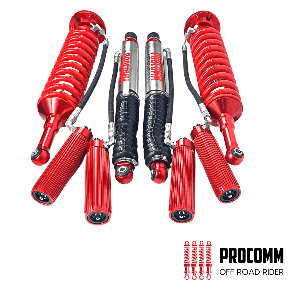 Red off-road shock absorbers for vehicles, high-performance suspension components.