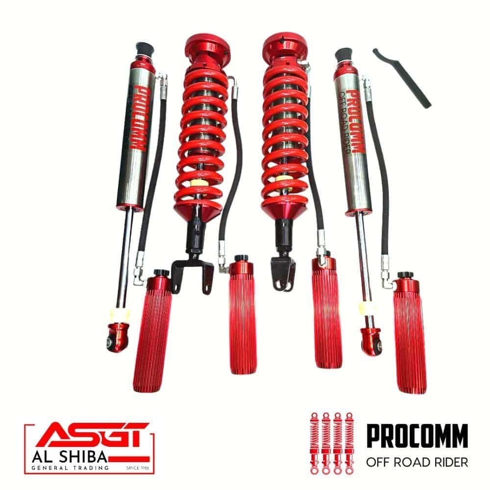 Shock absorber and suspension components for off-road vehicles, red color, branded "Procomm" and "AS.