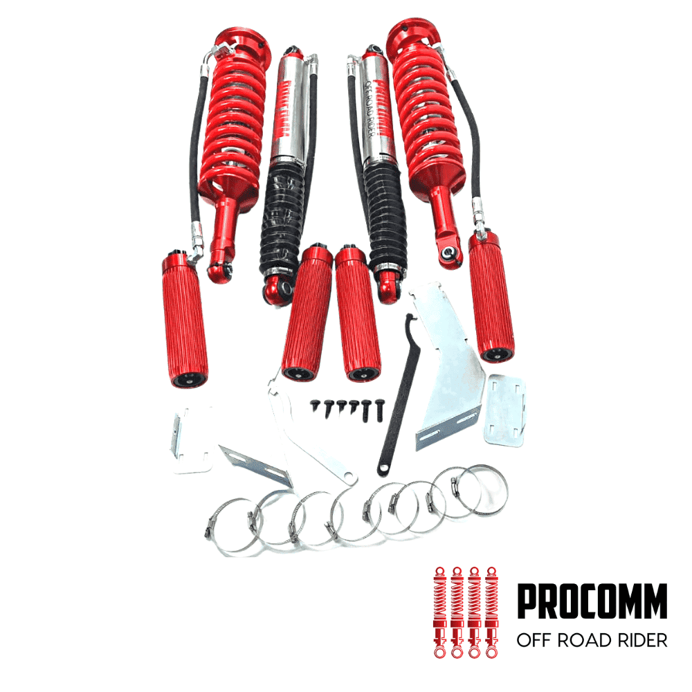 Red shock absorbers and mounting hardware for off-road vehicles, displayed on a white background.