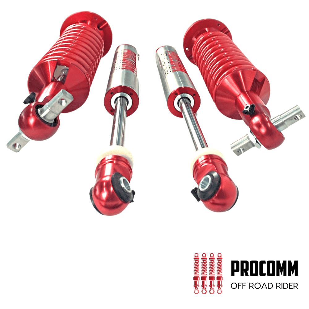 Red off-road shock absorbers for vehicles, high-performance suspension components.