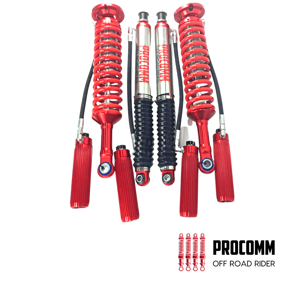 High-performance red off-road shock absorbers for rugged vehicle suspension systems.