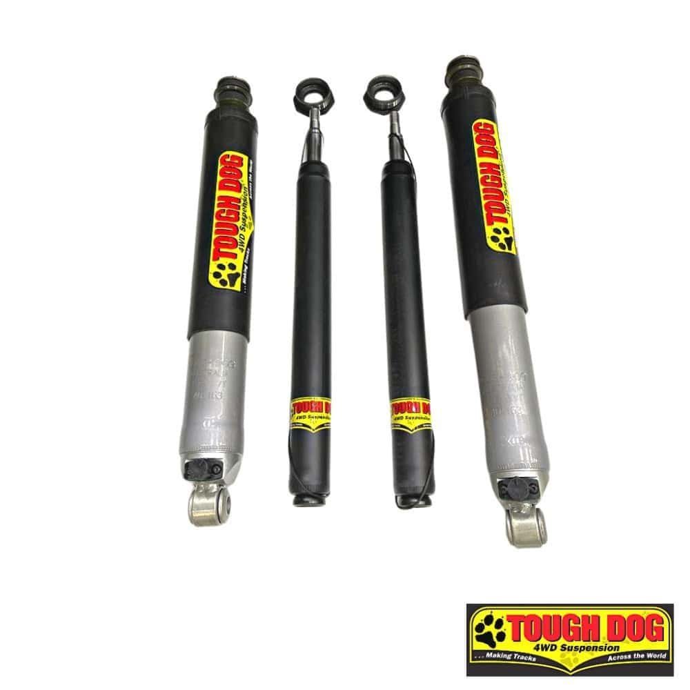 Shock absorbers for vehicle suspension, black with "TOUGH DOG" branding.