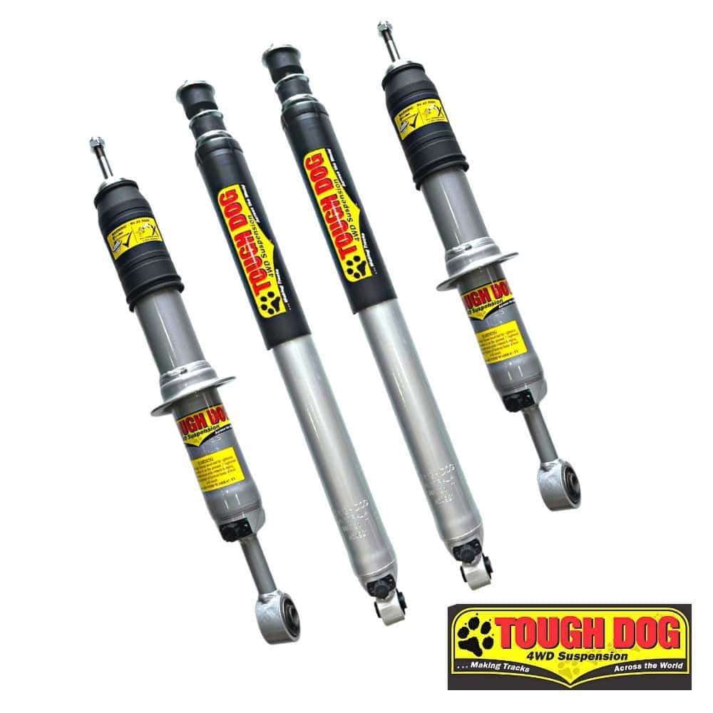 High-performance Tough Dog 4WD suspension shocks for off-road vehicles.