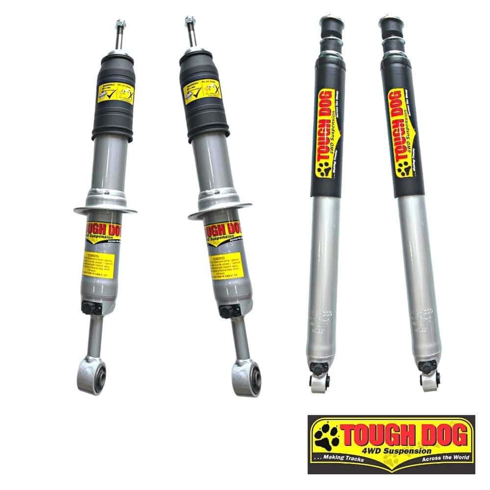 Heavy-duty Tough Dog 4WD suspension shocks for off-road vehicles. Durable, high-performance shock ab.
