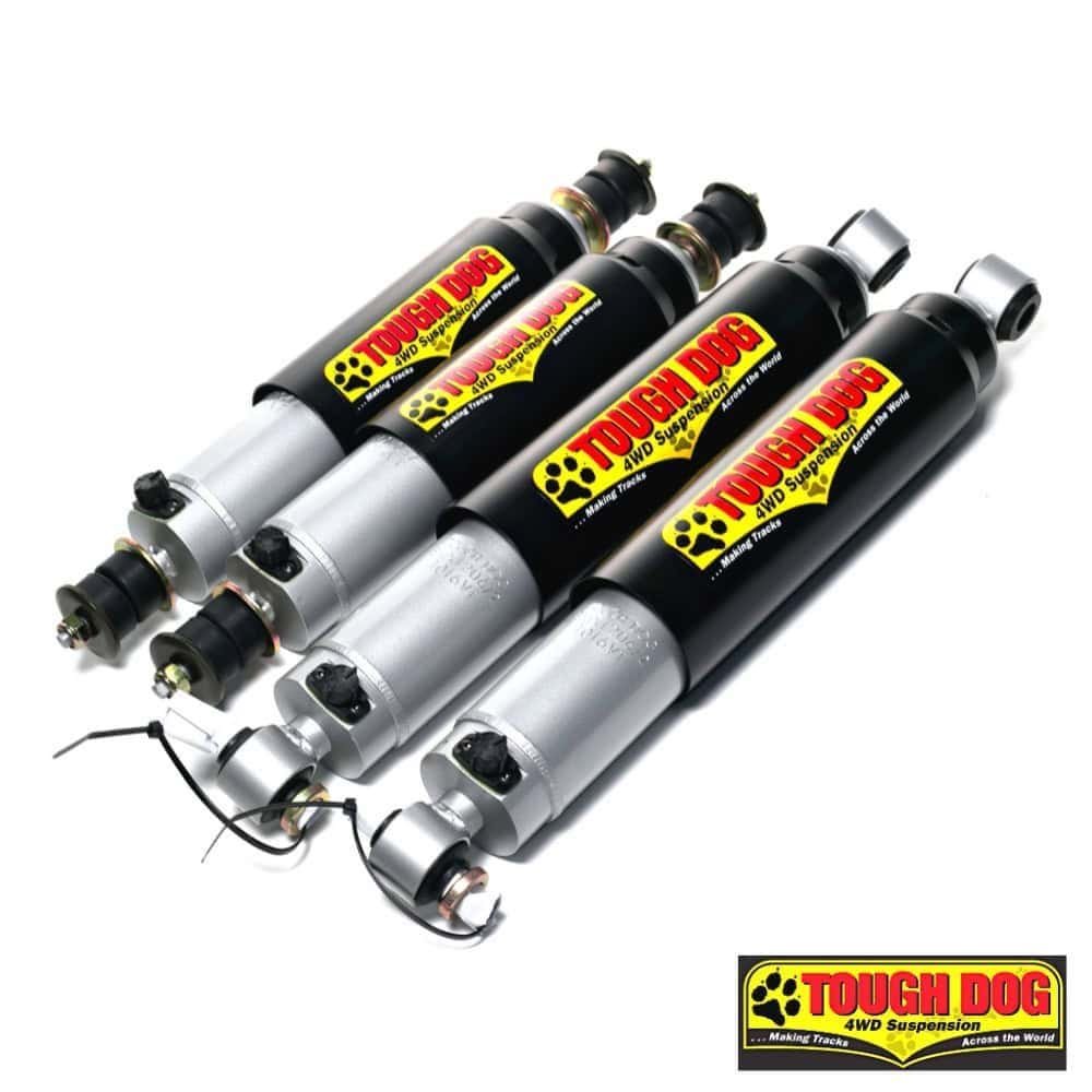 High-performance Tough Dog 4WD suspension shocks for off-road vehicles.