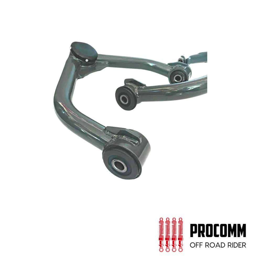 Motorcycle rear suspension arm with PROCOMM Off Road Rider branding.