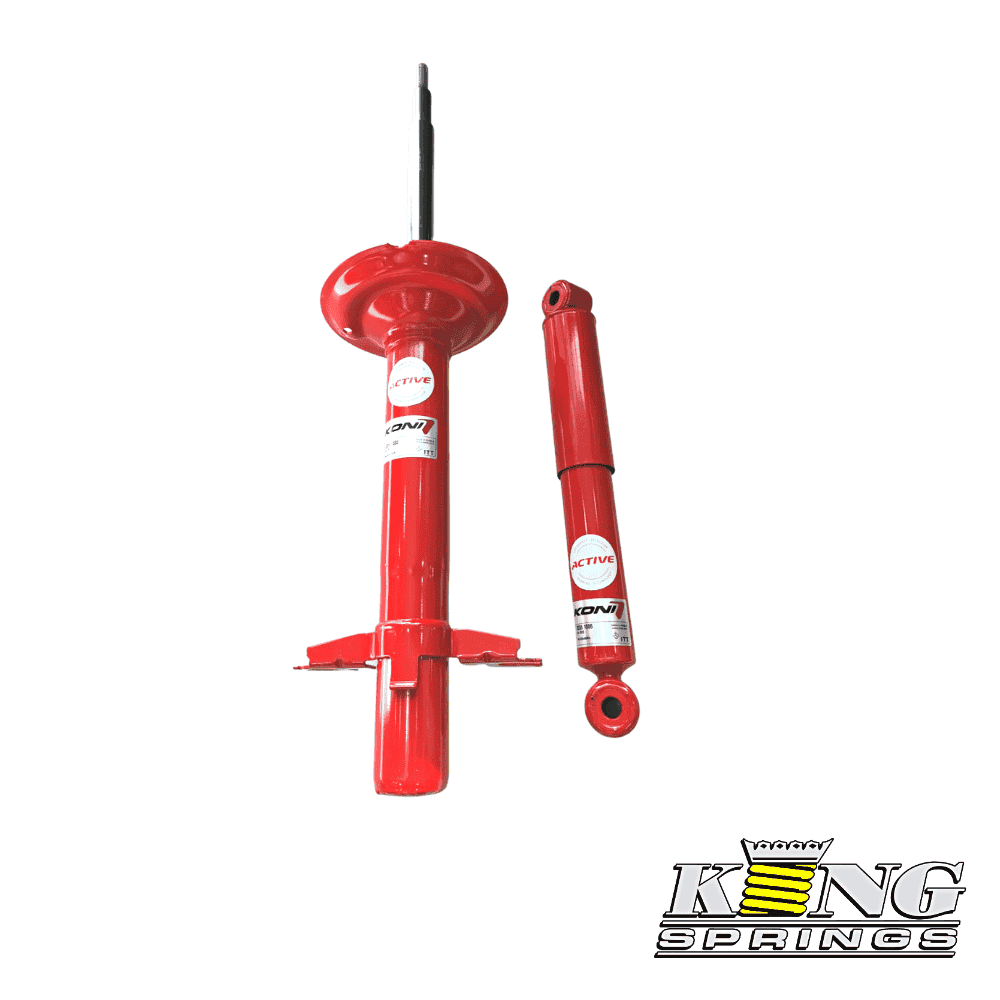High-performance red shock absorbers for vehicle suspension systems.