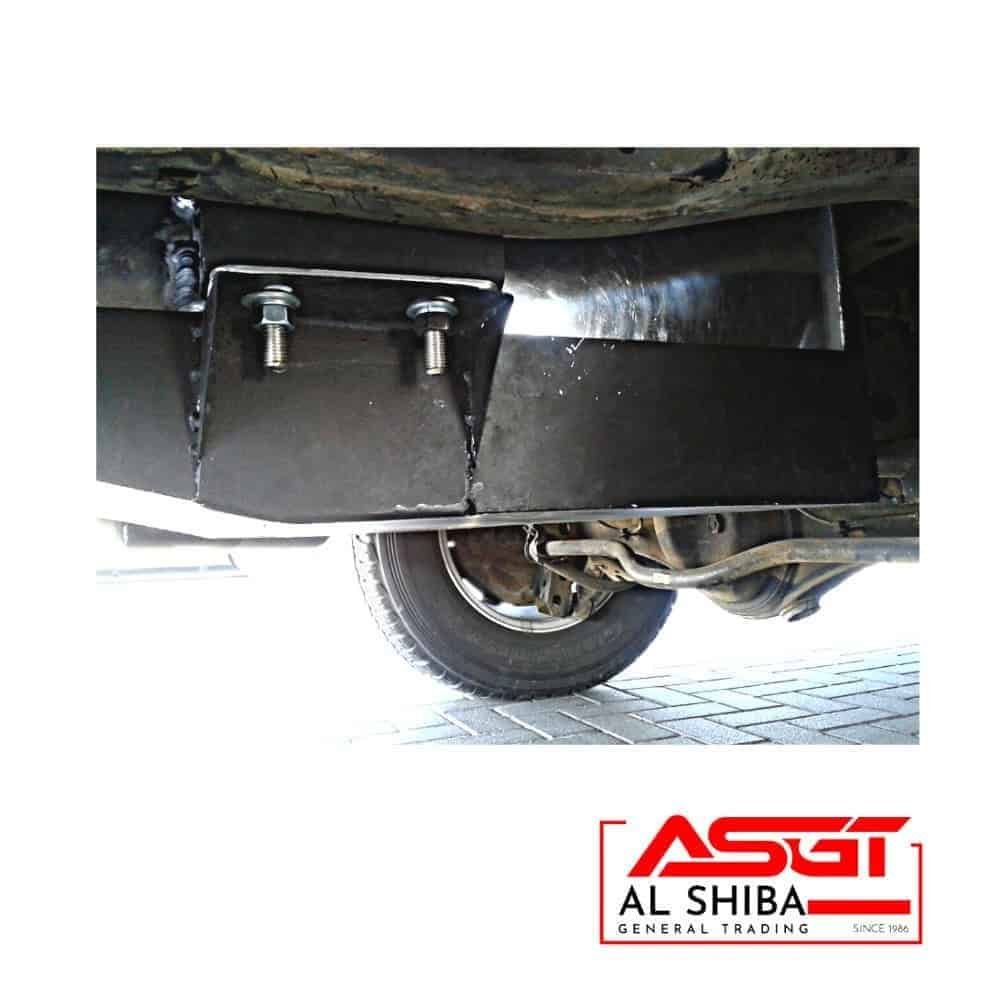 Heavy-duty vehicle undercarriage with mounting bolts and suspension components at Al Shiba General T.