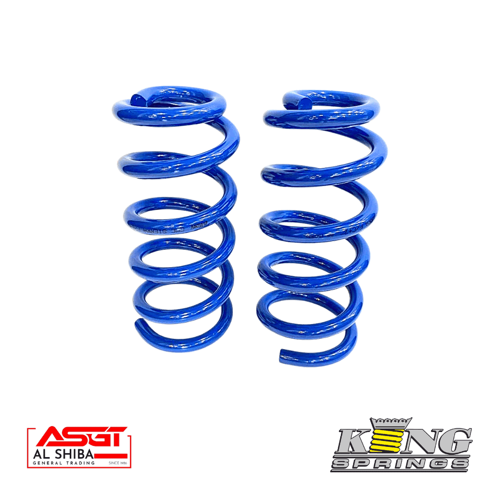 Blue coil springs for automotive suspension, high-quality King Springs.