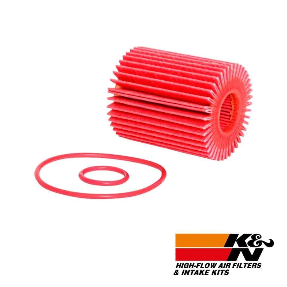 Red high-flow air filter with rubber O-rings for automotive filtration systems.