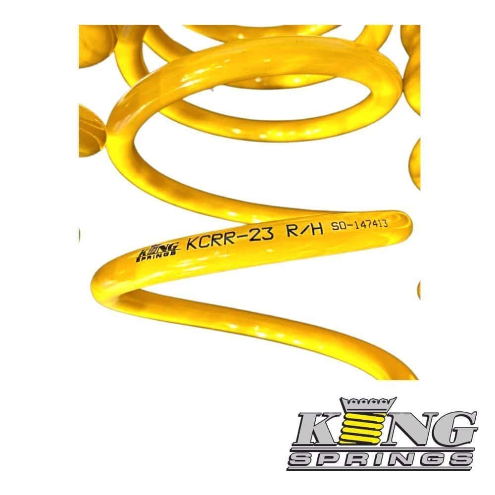 Kong Springs yellow coil spring for industrial machinery and equipment.