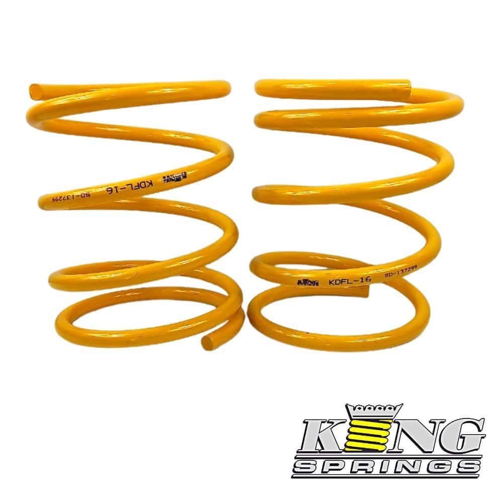 Heavy-duty yellow coil springs for automotive suspension systems.