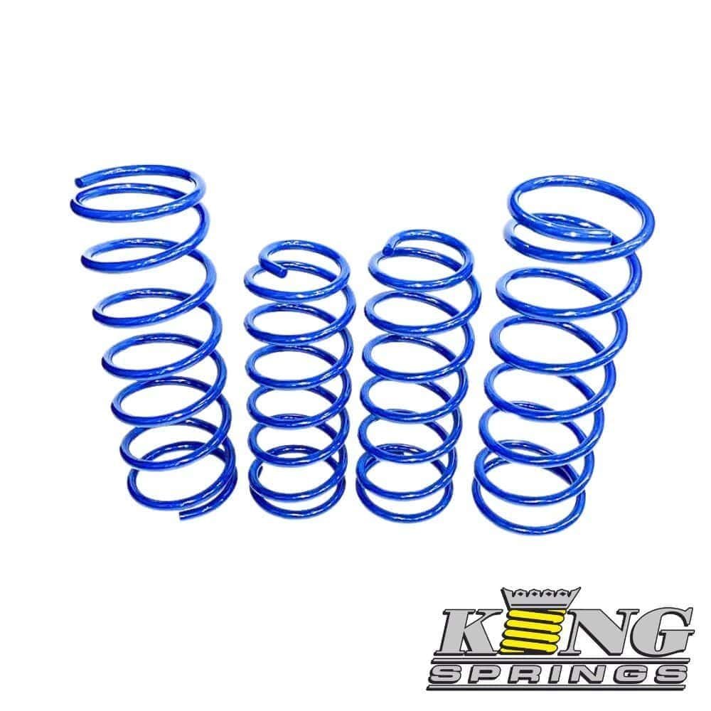 Blue coil springs for industrial or automotive use, displayed in a row.
