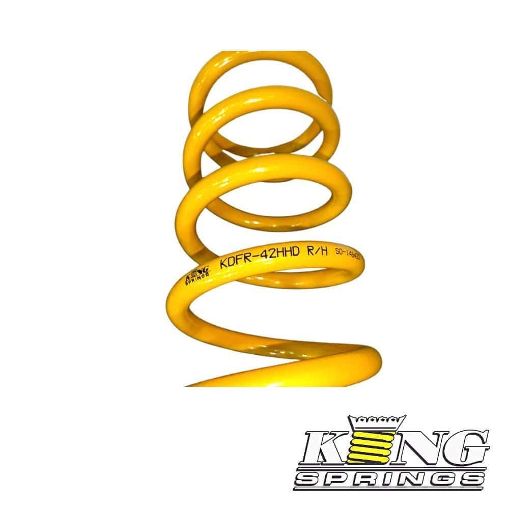 High-quality yellow coil spring for automotive suspension systems.