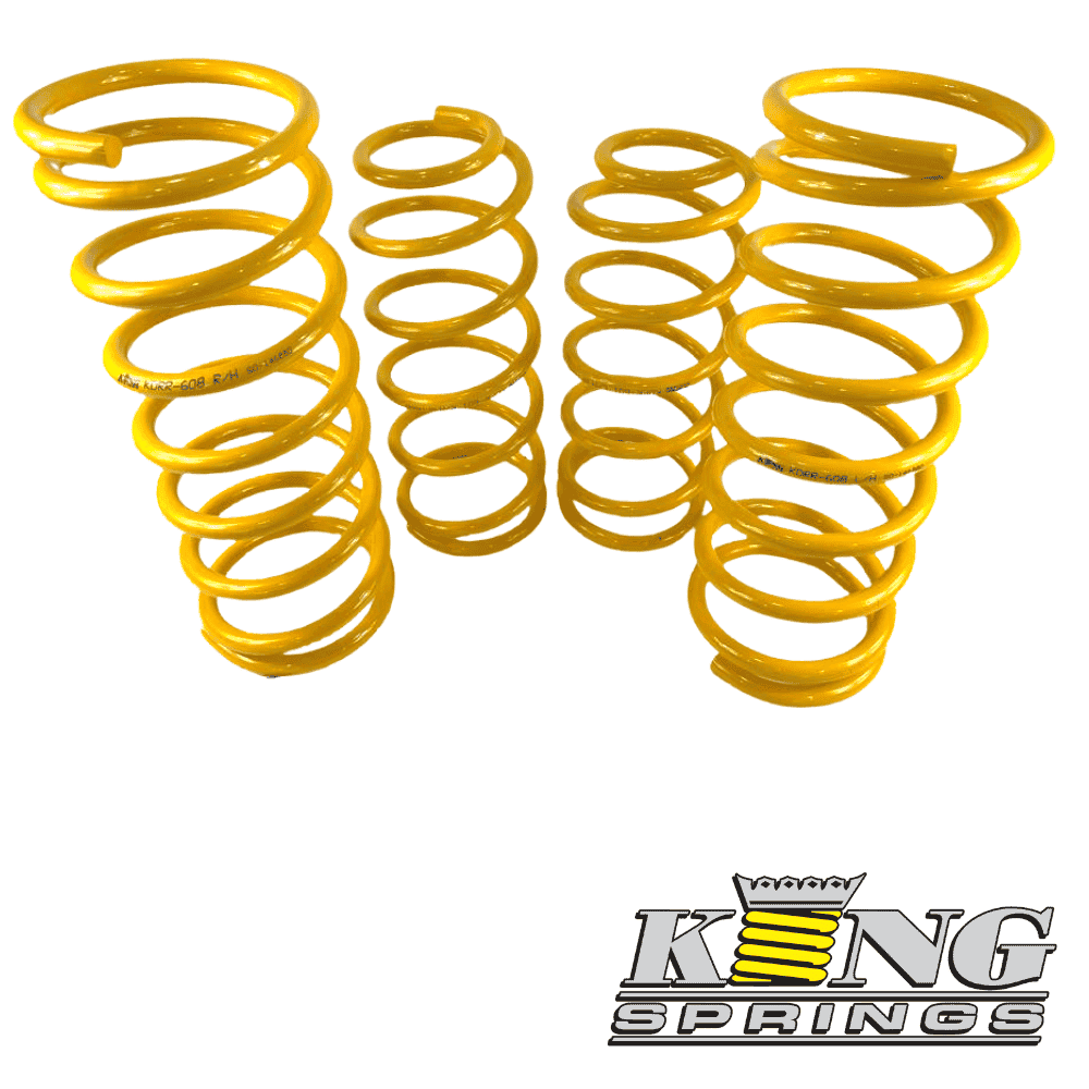 Yellow coil springs for automotive suspension from Al Shiba General Trading.