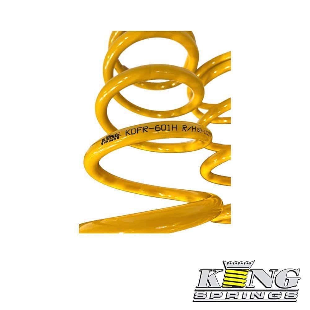 High-quality yellow coil spring for industrial and automotive applications.