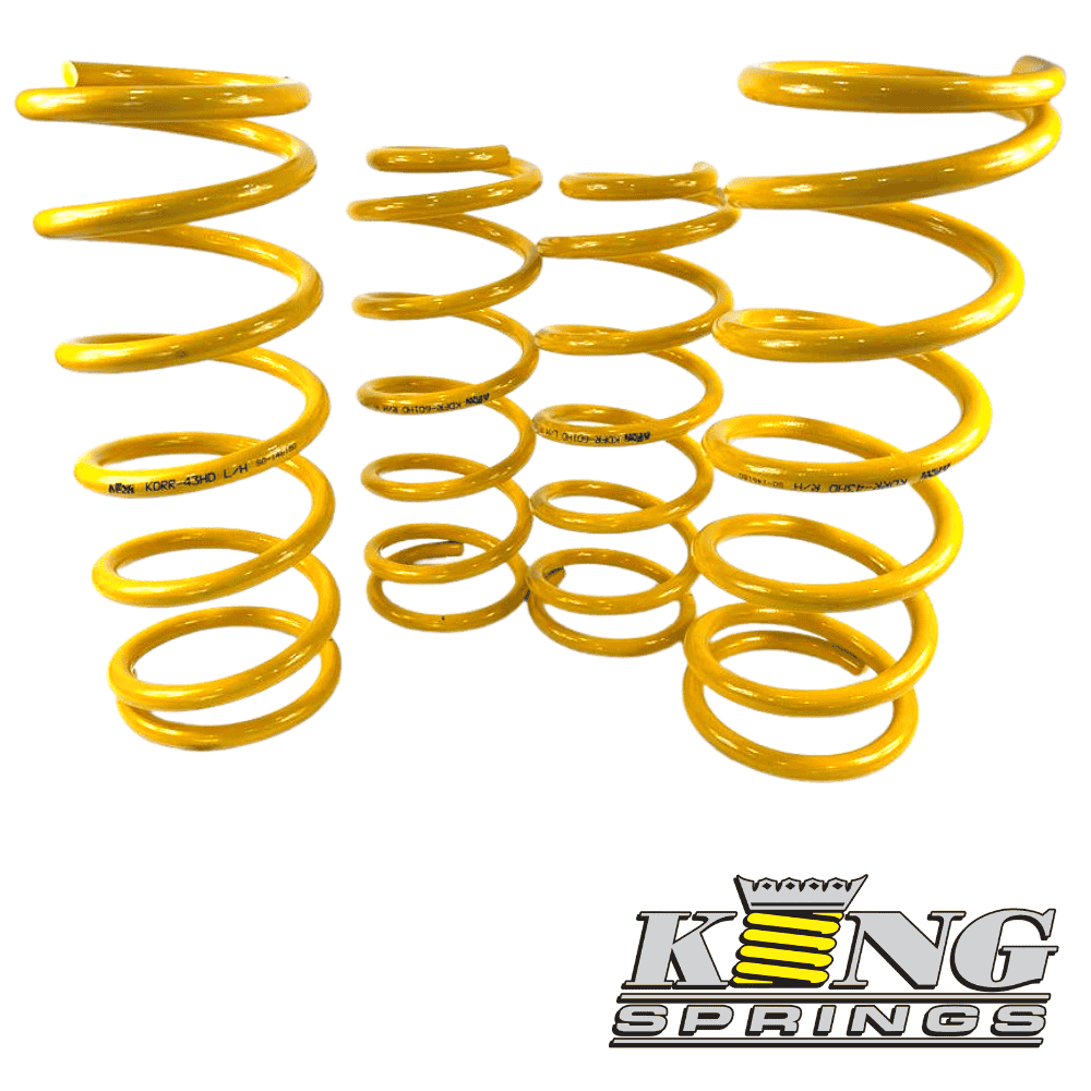 Yellow coil springs for automotive suspension, high-quality King Springs.