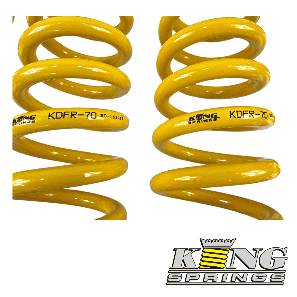 High-quality yellow coil springs for automotive suspension systems.
