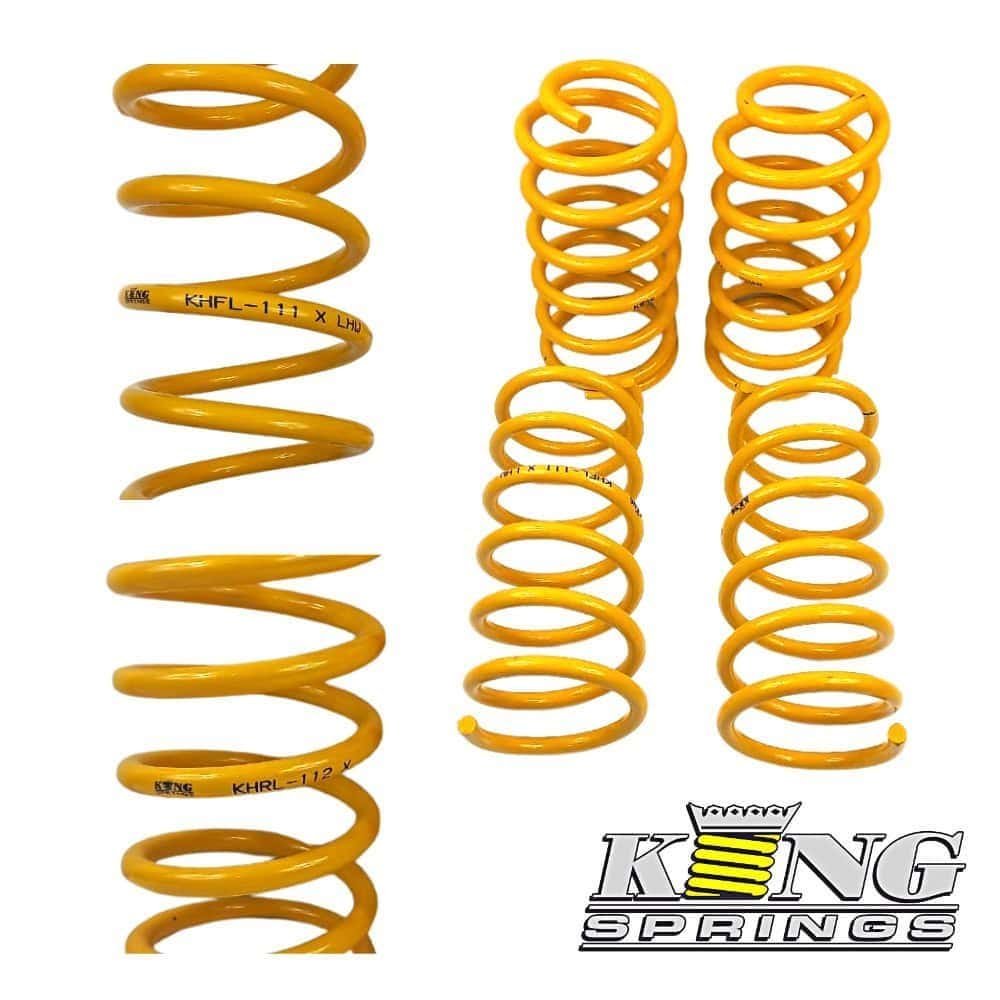 High-quality yellow coil springs for automotive suspension systems.