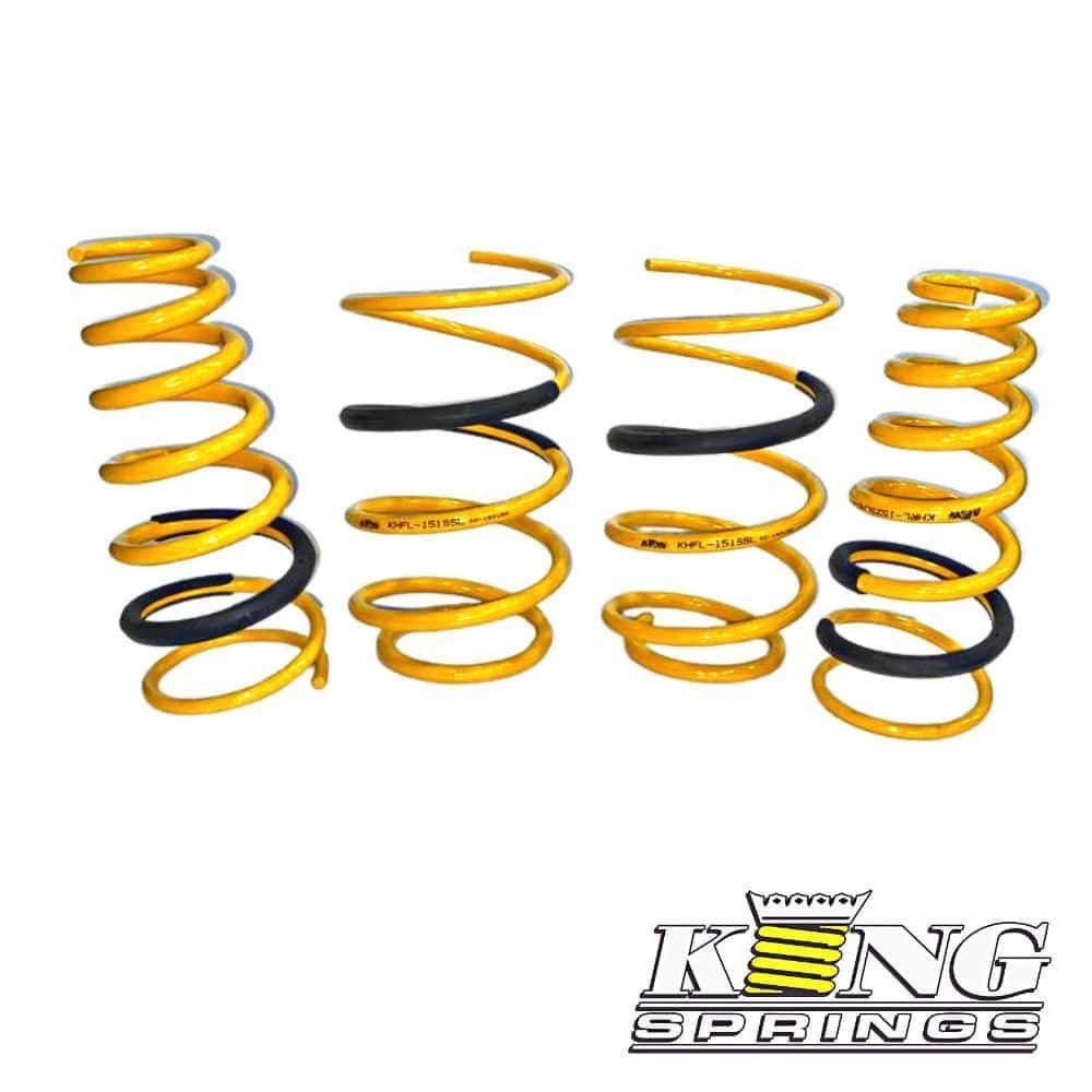 Automotive coil springs for vehicle suspension, yellow and black color.