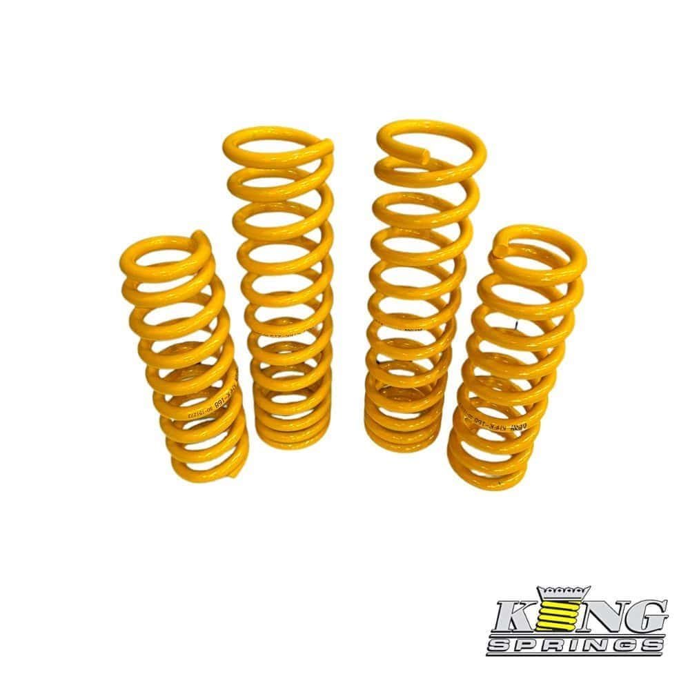 Yellow coil springs for automotive suspension, high-quality and durable.