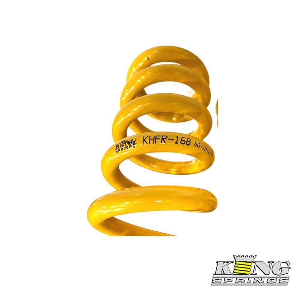 High-quality yellow coil spring for automotive suspension systems.