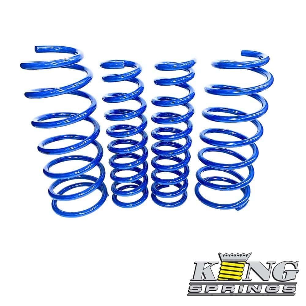 Blue coil springs for industrial or automotive use, displayed in a row.