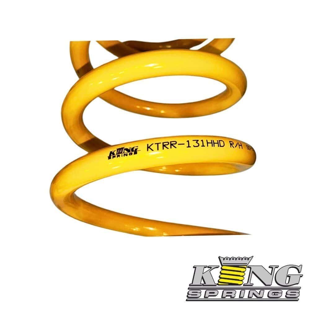 High-quality yellow coil spring for industrial and mechanical applications.