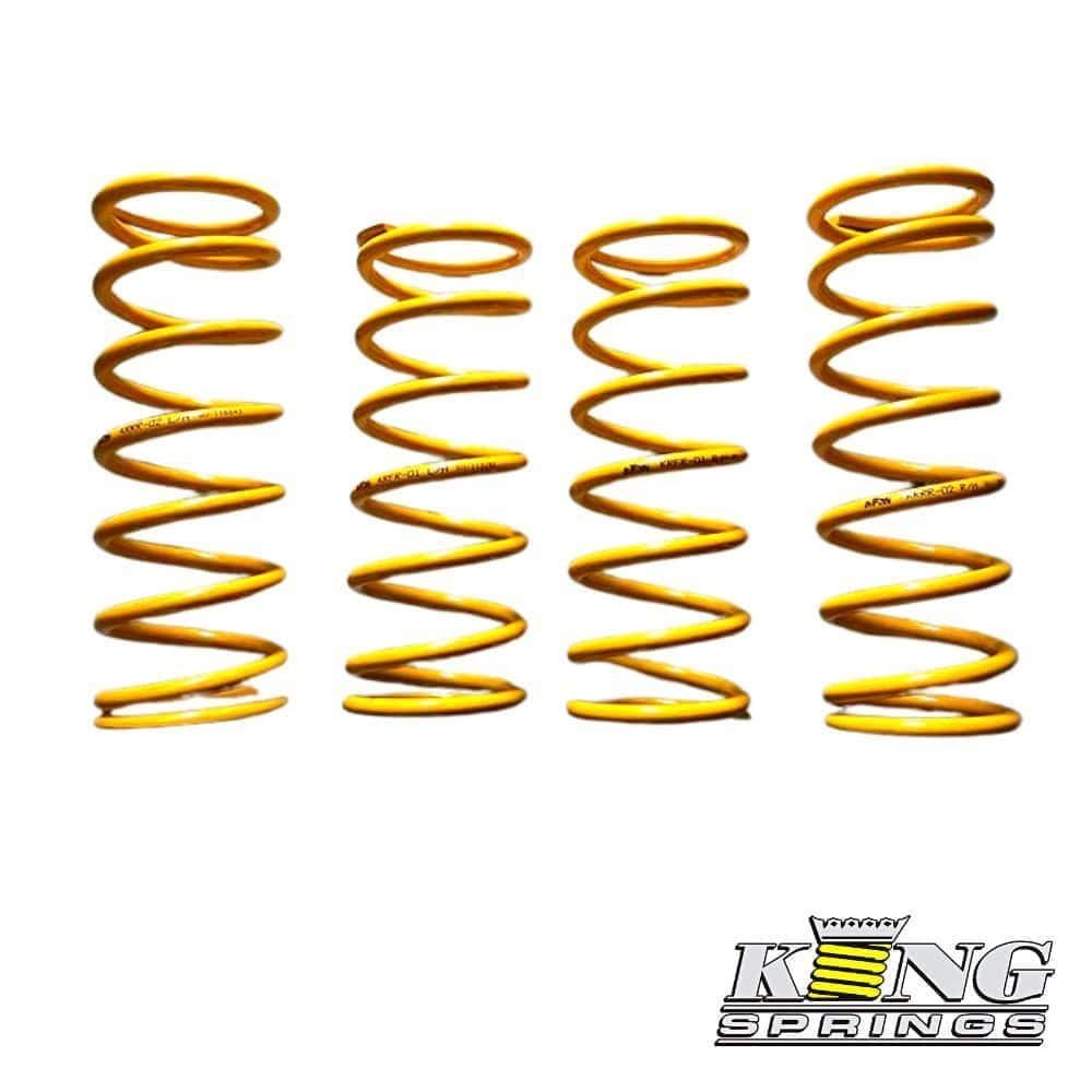 Yellow coil springs for automotive suspension systems, high-quality and durable.