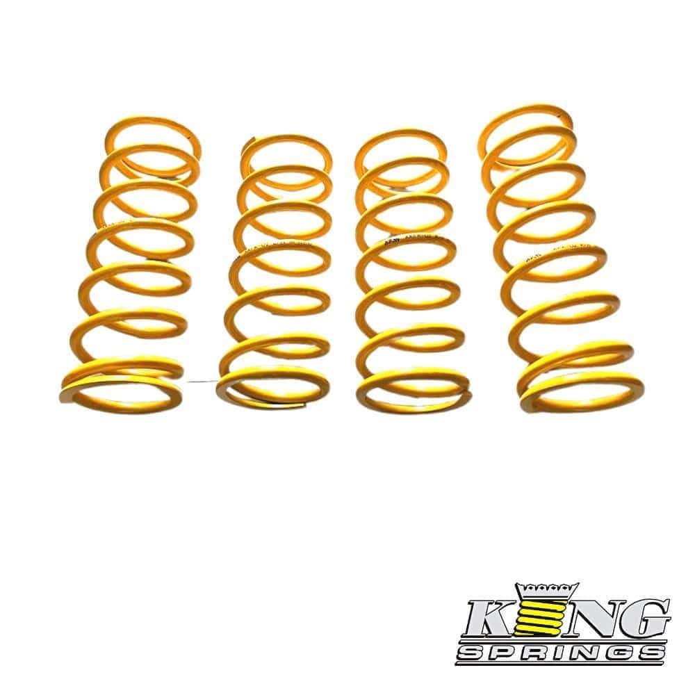 Yellow coil springs for automotive suspension, high-quality shock absorber components.