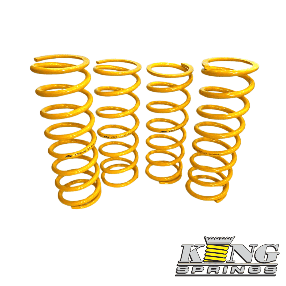 Yellow coil springs for automotive suspension, high-quality shock absorbers.