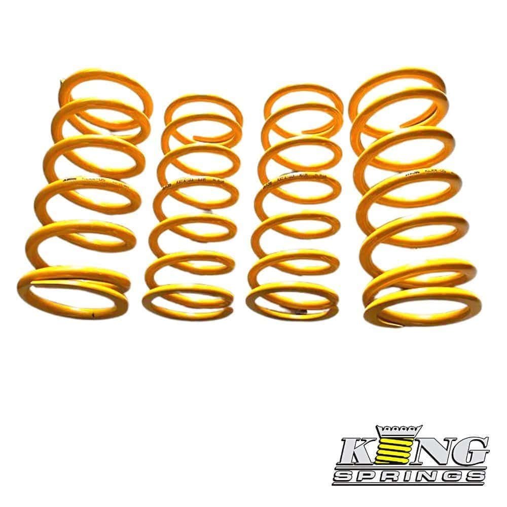 Yellow coil springs for automotive suspension, high-quality shock absorber components.