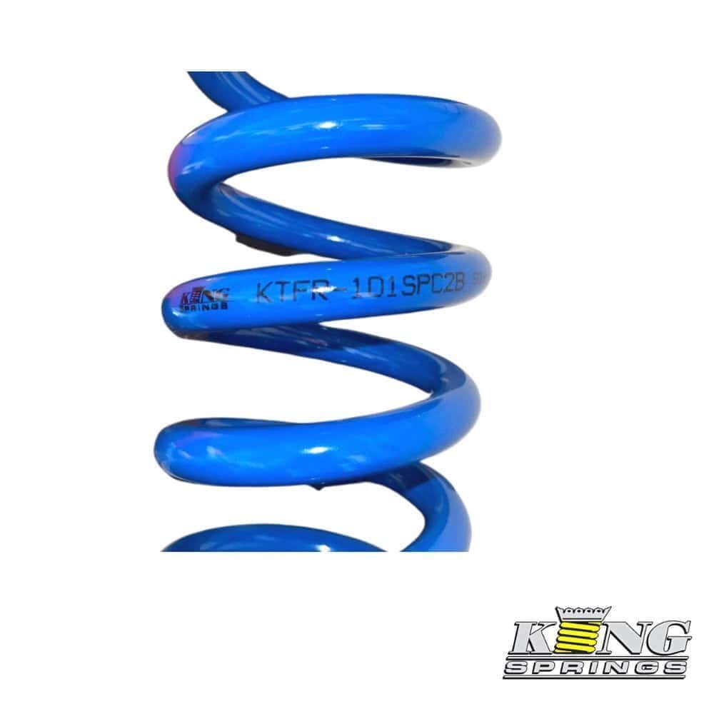 Blue coil spring for industrial or automotive use, high-quality and durable.