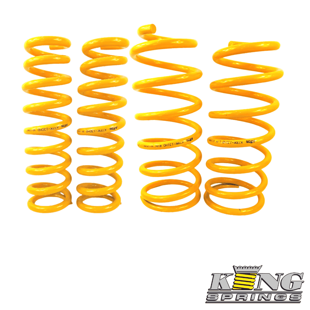 Bright yellow coil springs for automotive suspension, showcasing durability and quality from Al Shib.